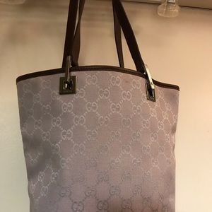 Like new lavender Gucci bag $250.00